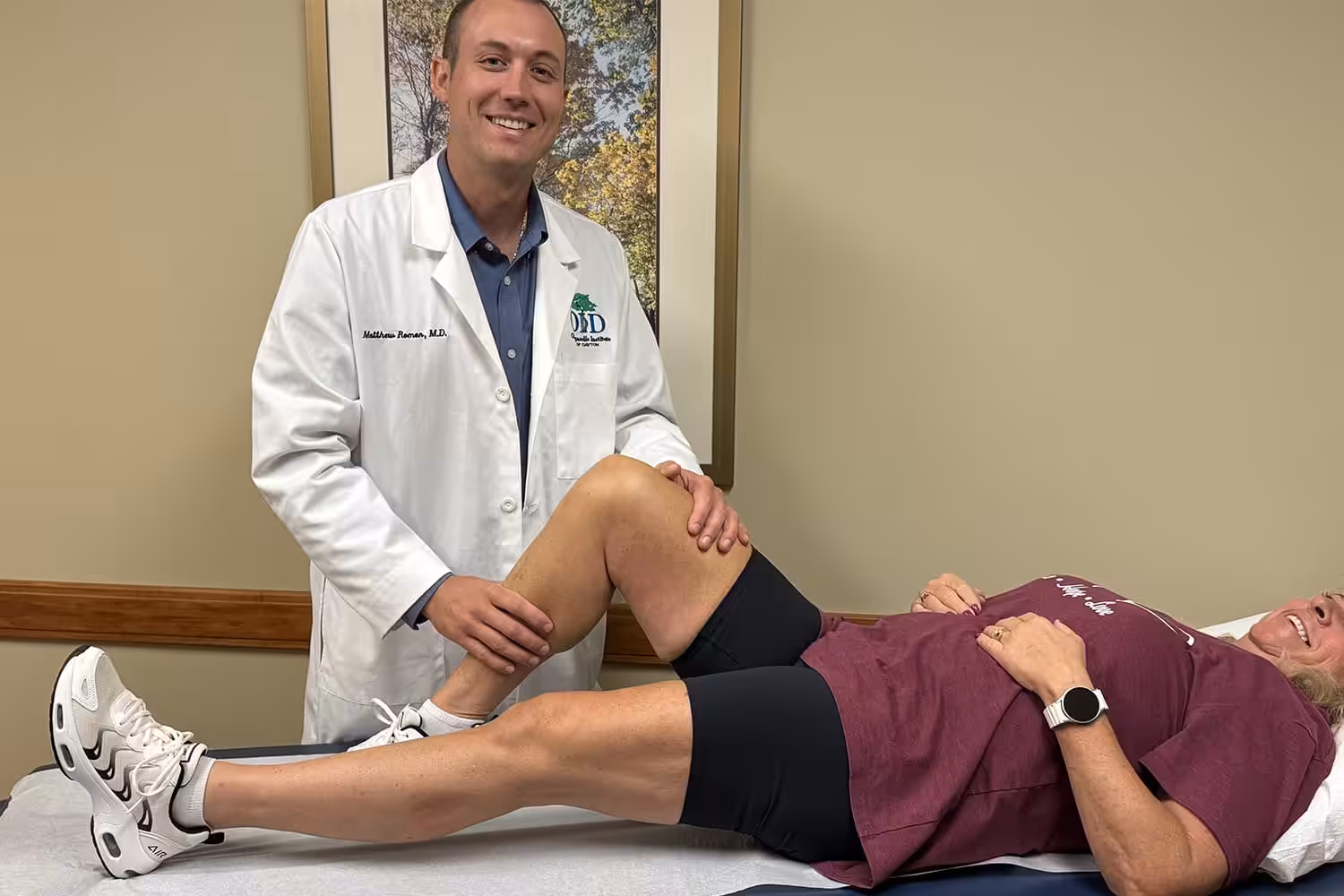 Dr. Romer with a patient