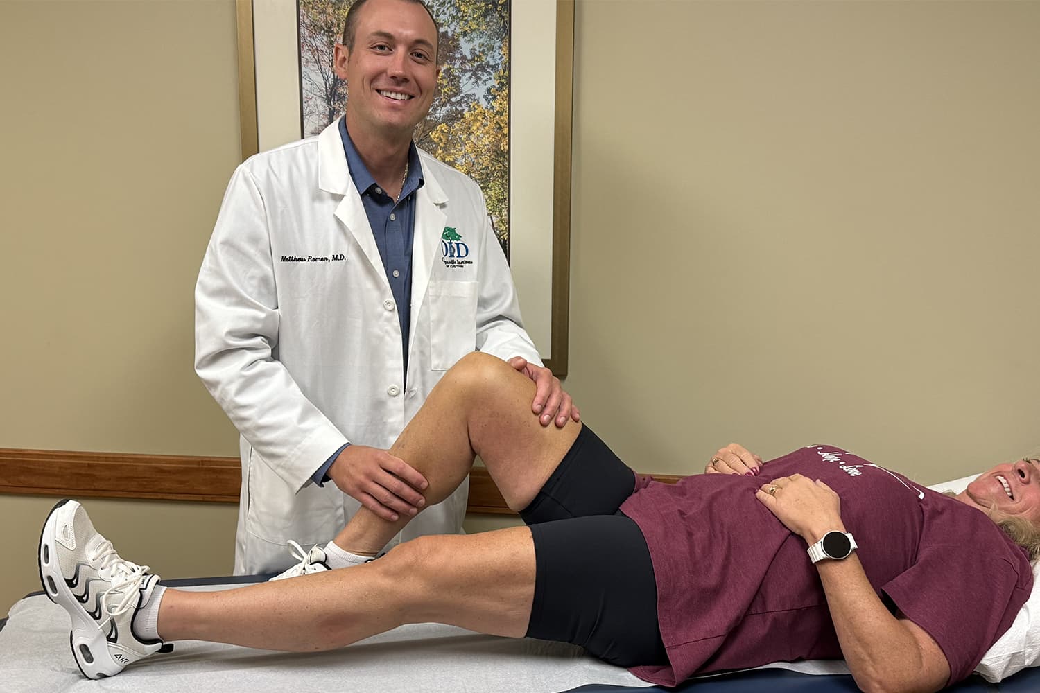 Dr. Romer with a patient
